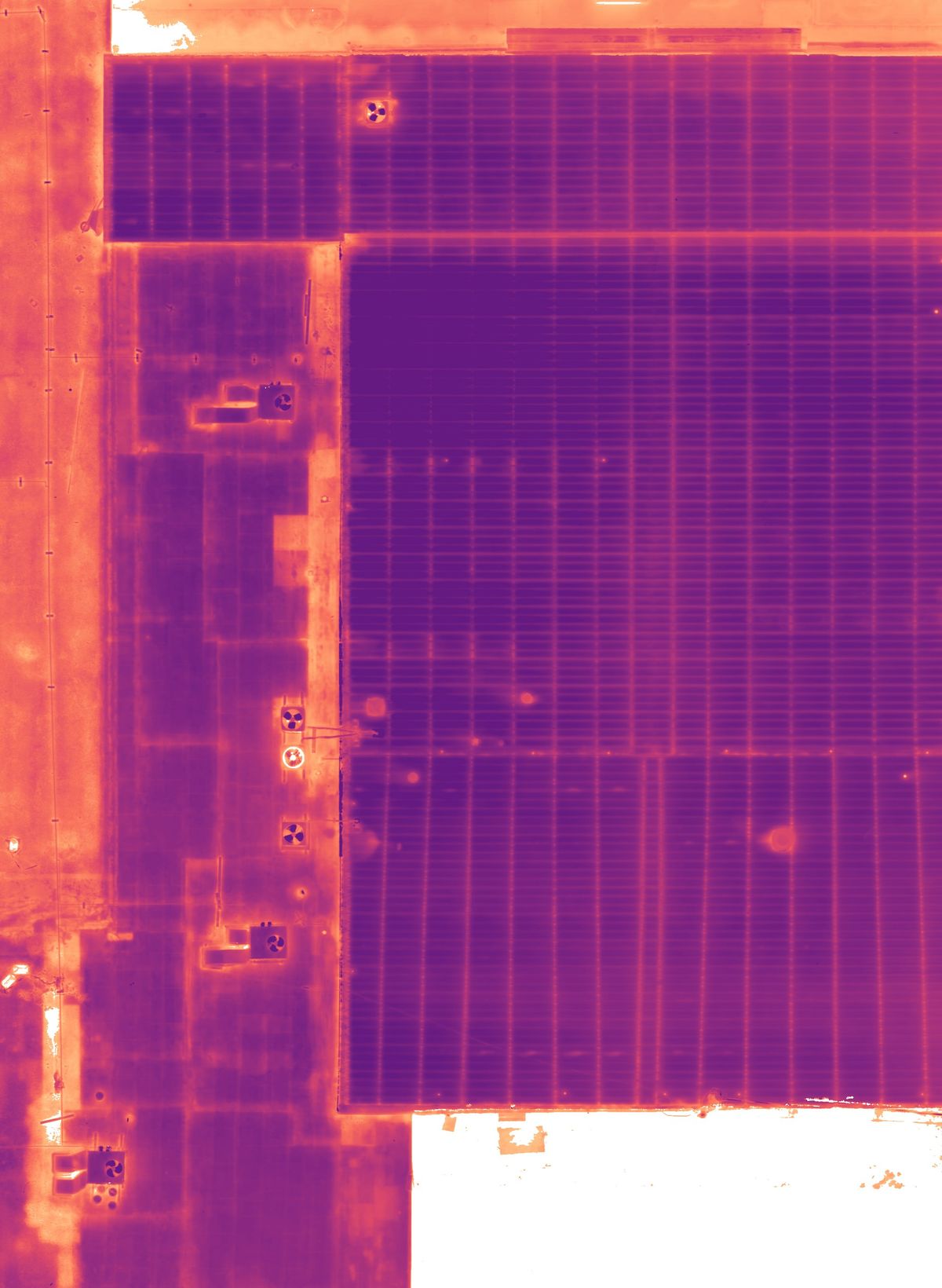 Thermal map of the same roof, overlaid on the daytime map